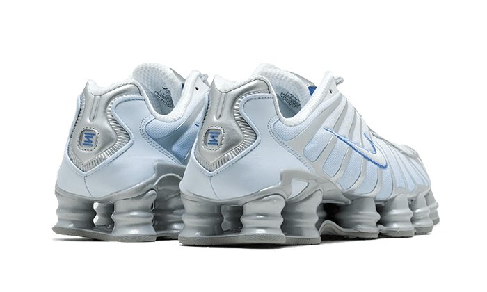 Nike shox silver and blue best sale