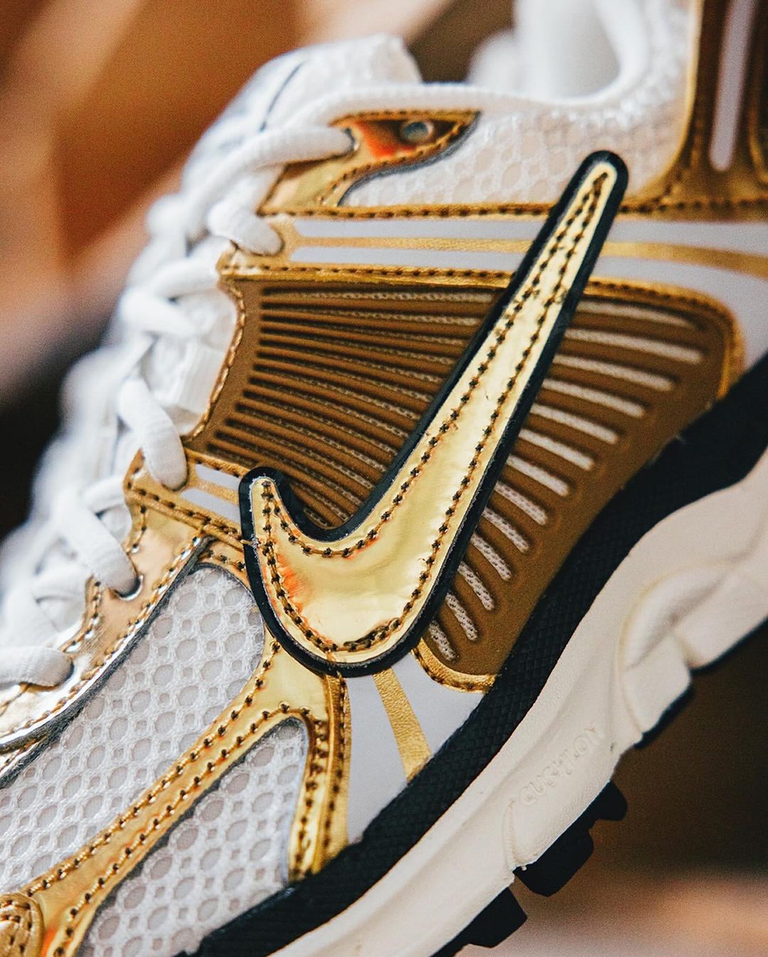 Nike gold women's sneakers online